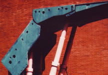 industrial grabber claw abandoned factory red green