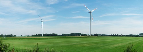 Three Wind turnbines in the fields, Germany, panorama photo